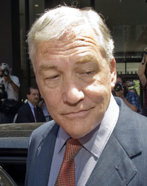 Conrad Black leaving a federal court building in Chicago